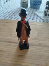 Alte Holzfigur der Vagabund